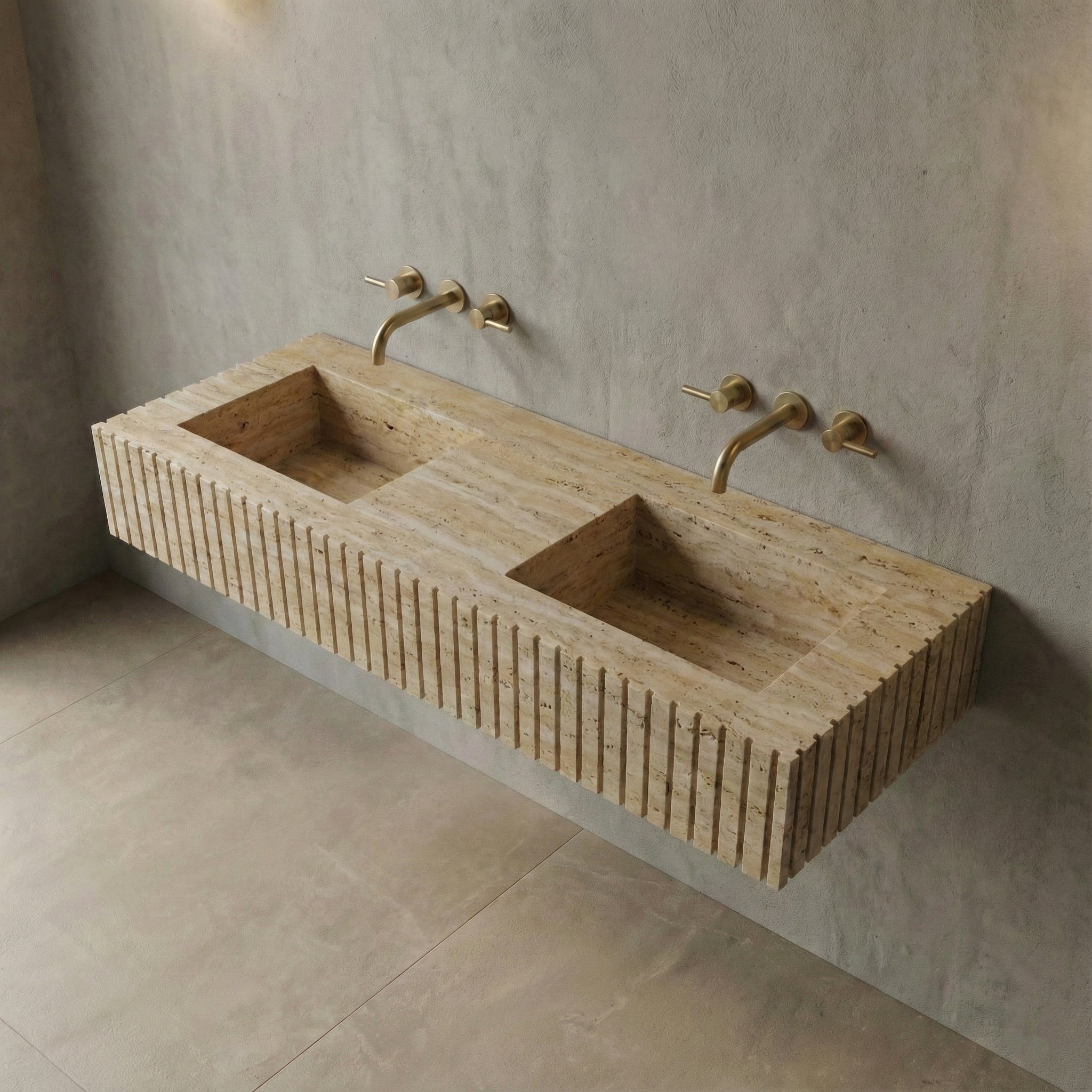 High-angle view of a ribbed beige Travertine stone double sink, featuring dual integrated basins and a matte honed natural finish.