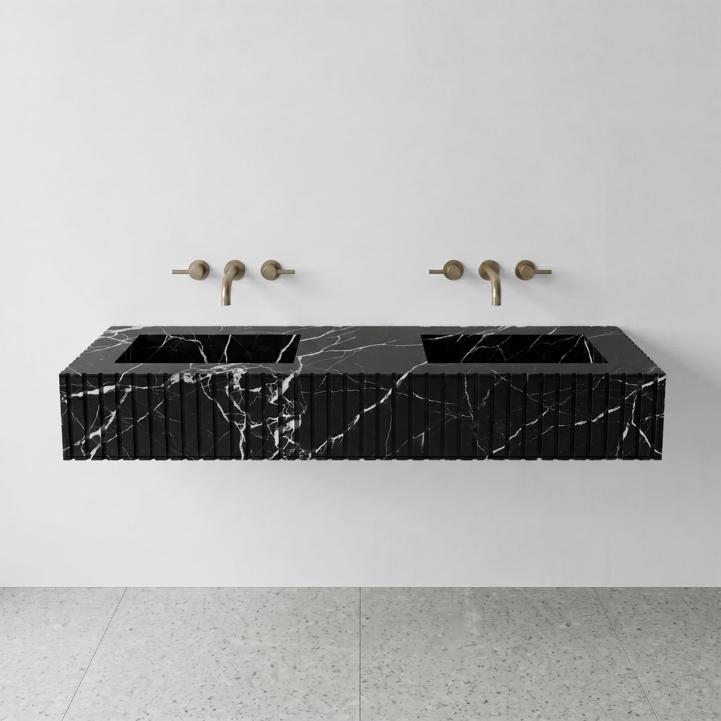 Front profile of a floating double vanity crafted from Nero Marquina marble, featuring a custom ribbed stone apron and striking white lightning veins on black stone.