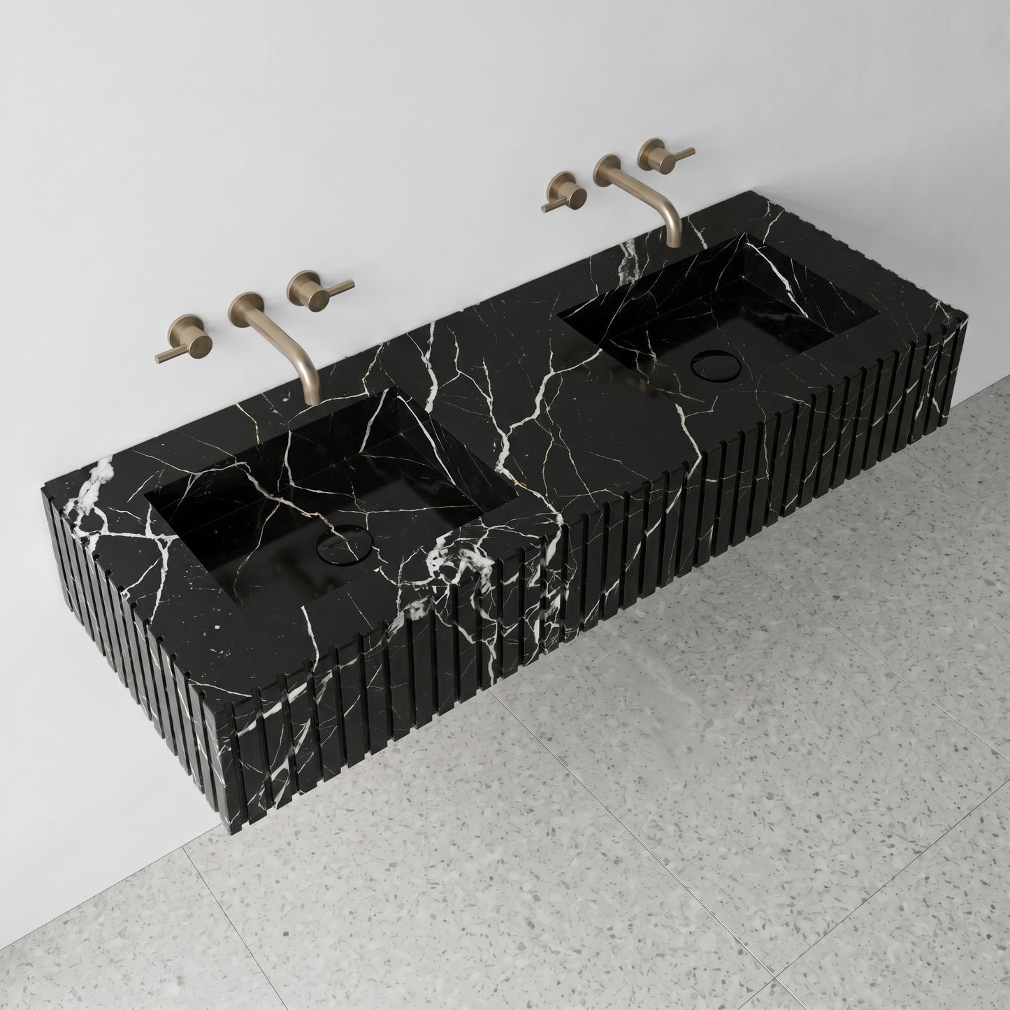 High-angle view of a fluted Black Marquina marble double sink showing sleek integrated rectangular basins and polished black natural stone texture.
