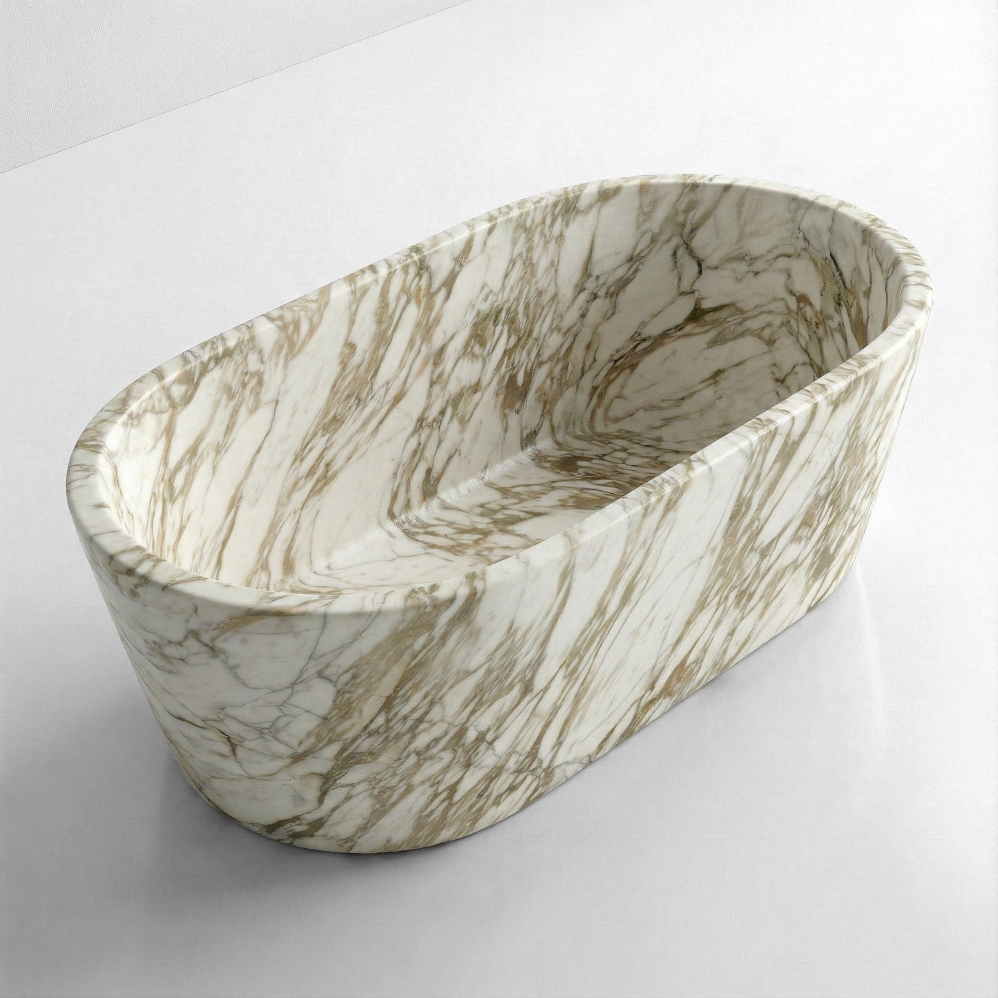 An elevated, angled view of an oval Calacatta Gold tapered bathtub, showcasing the continuous natural stone patterns flowing from the exterior to the interior.