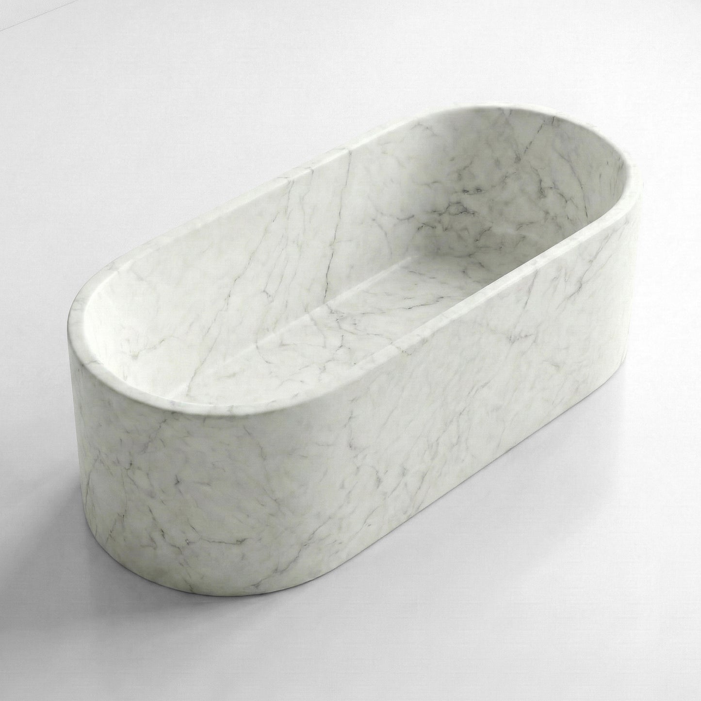 Isometric side view of a solid Carrara marble bathtub showing the stone's classic soft white background and subtle grey feathering.
