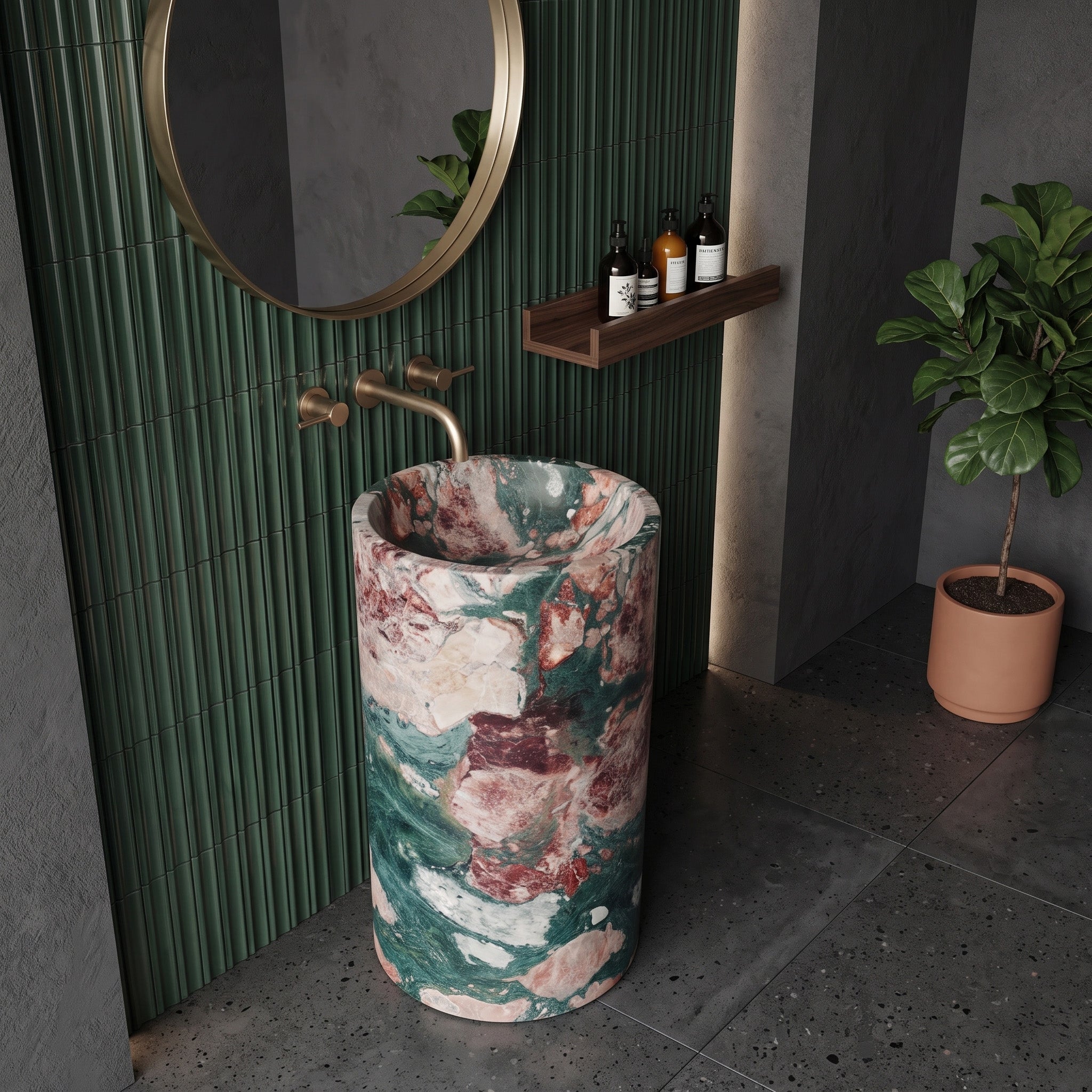 Freestanding Four Seasons marble round pedestal basin in a luxury powder room with fluted forest green wall tiles, bronze mirror, and potted plant.