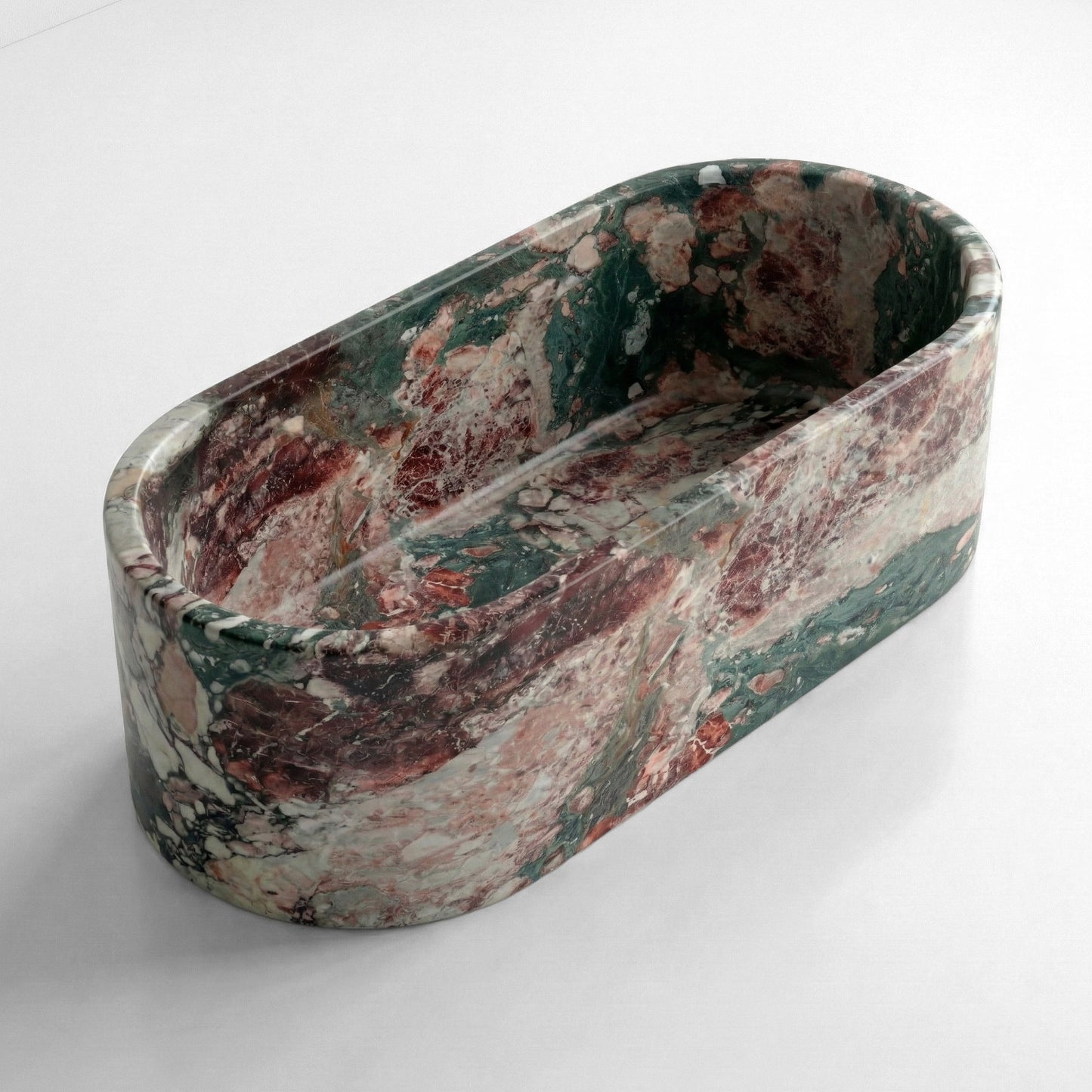 Angled isometric view of a freestanding Four Seasons marble bathtub, displaying a vibrant spectrum of green, burgundy, and gold veining.