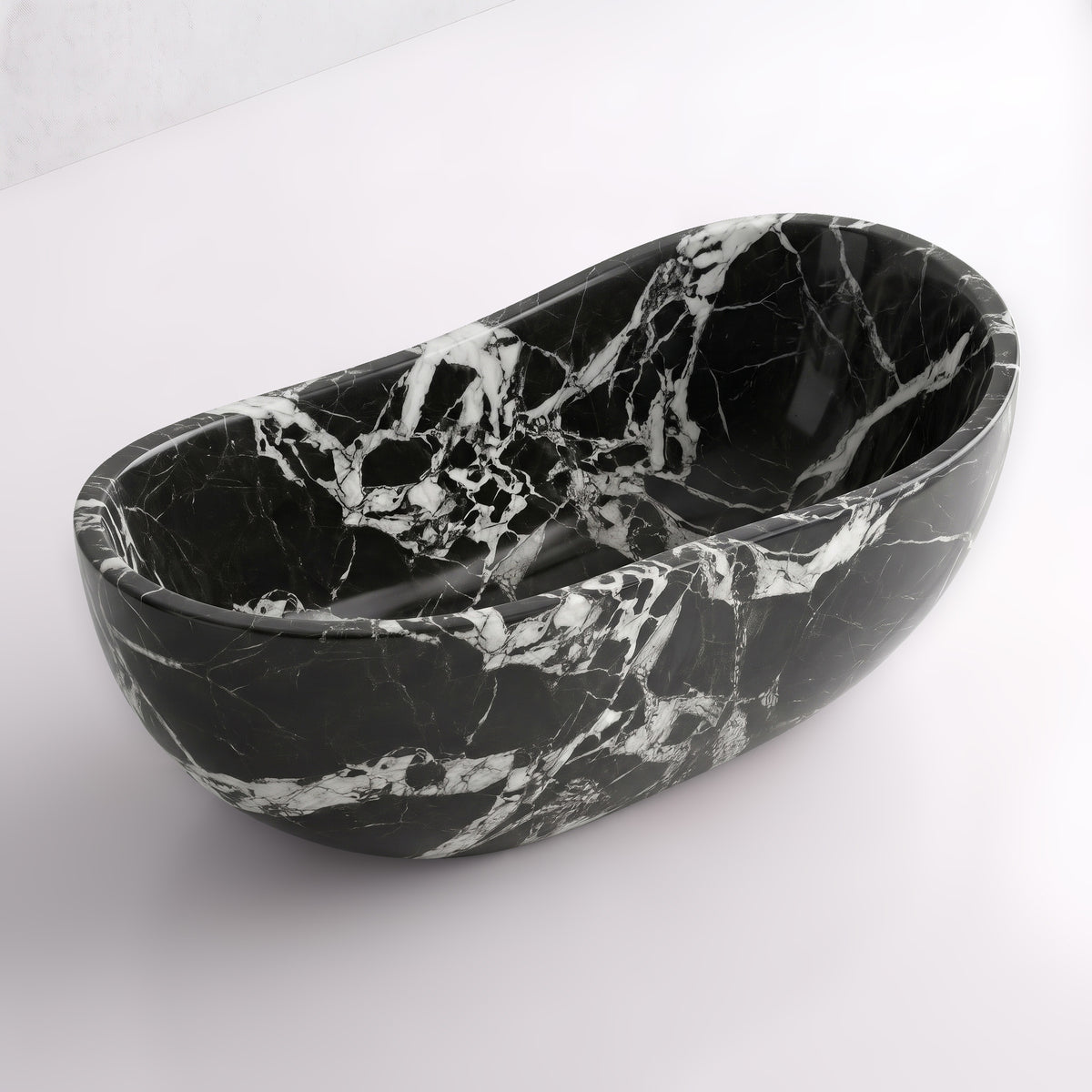 Elevated three-quarter perspective view of the Grand Antique marble wave soaking tub, highlighting the asymmetrical undulating rim, seamless solid-carved interior, and striking white calcite ribbons traversing pitch-black stone.
