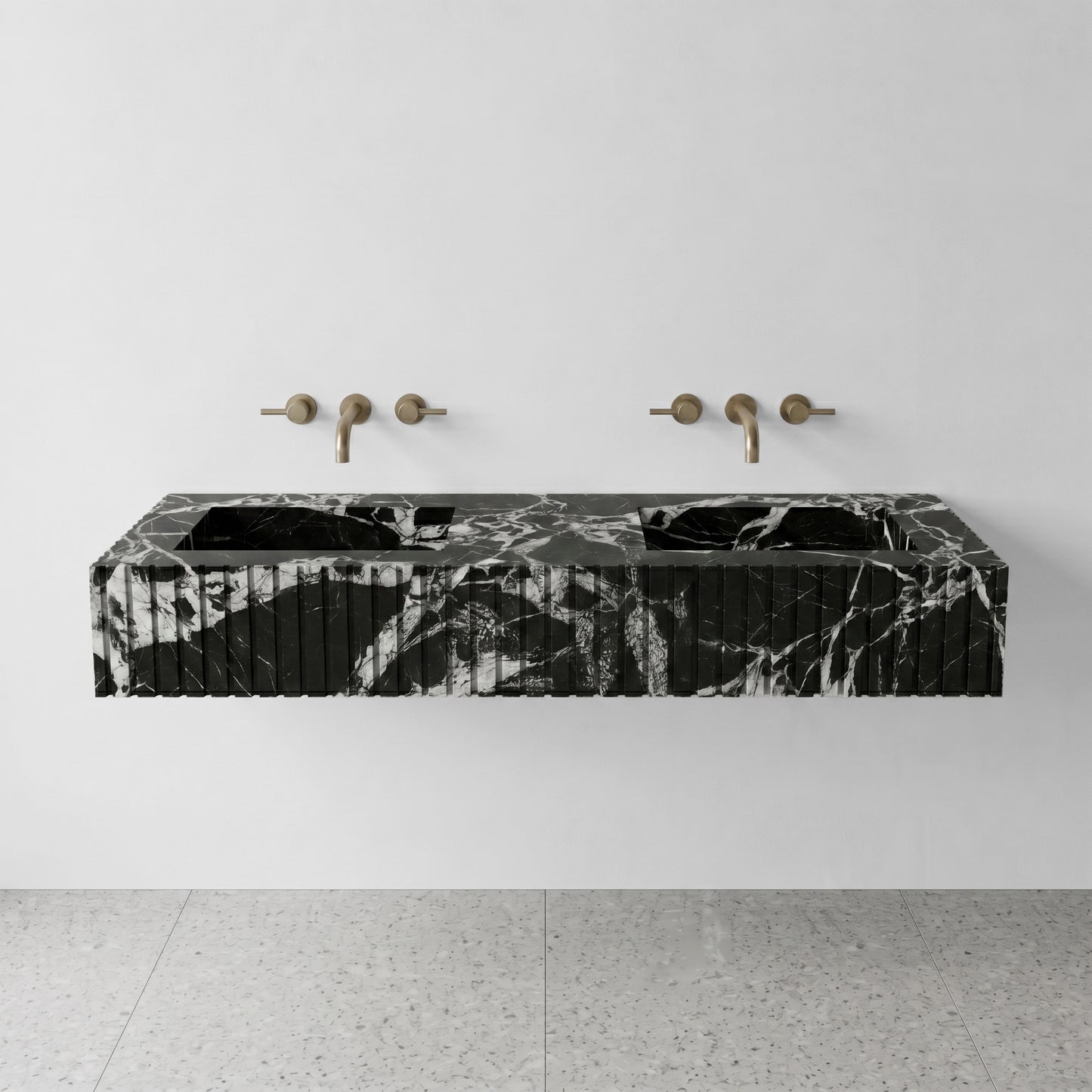 Front profile of a luxury wall-hung double vanity crafted from high-contrast Grand Antique marble, showcasing vertical ribbed detailing and dramatic black and white brecciated patterns.