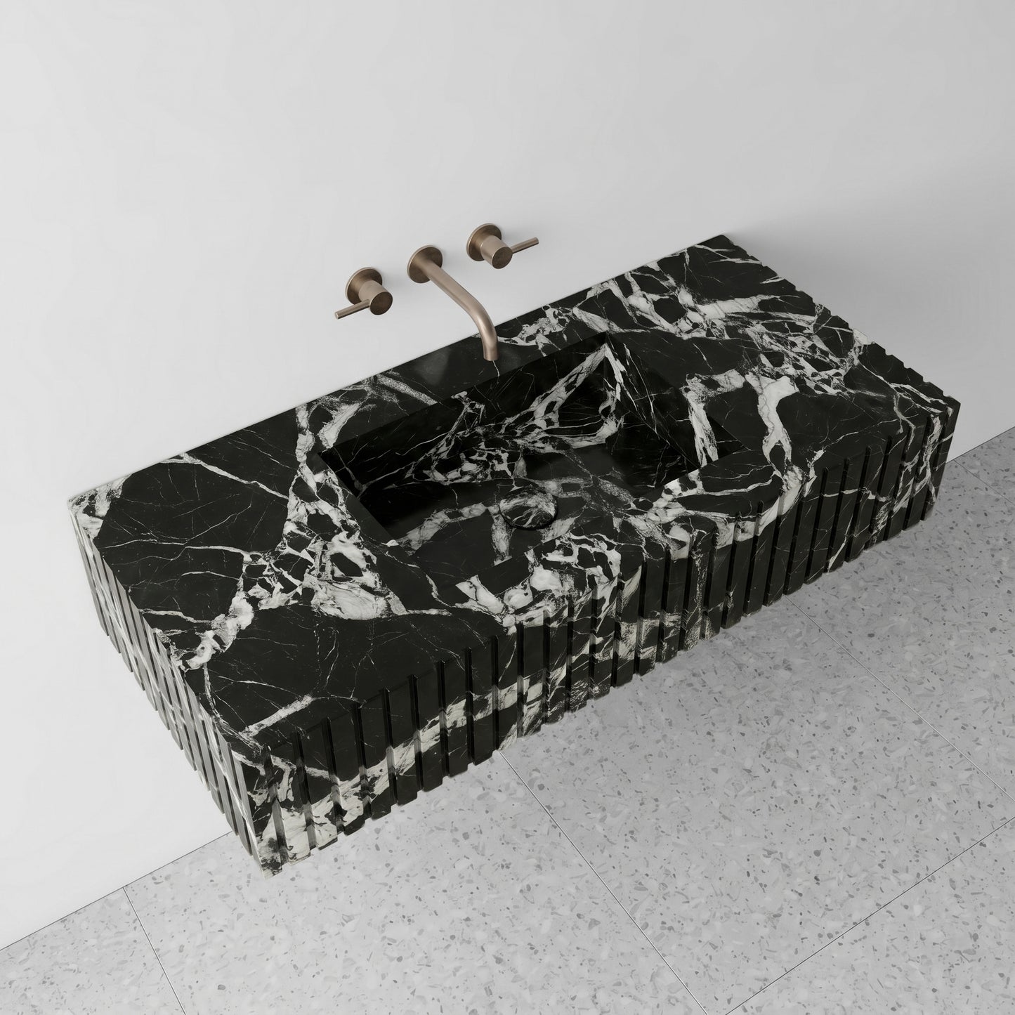 High-angle perspective view of a floating Grand Antique marble single vanity, showcasing the dramatic brecciated fragments, integrated square basin with a matching stone drain cover, and light terrazzo flooring.