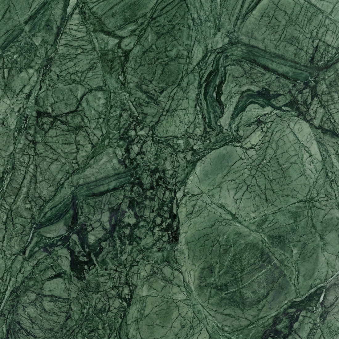 Dark forest green Guatemala marble with an intricate web of black veining and a polished finish for high-end interior design.