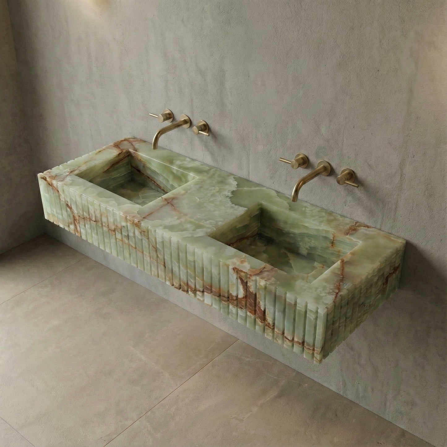 High-angle view of a wall-mounted Green Onyx semi-precious stone sink, showcasing dual integrated basins and intricate natural mineral patterns.