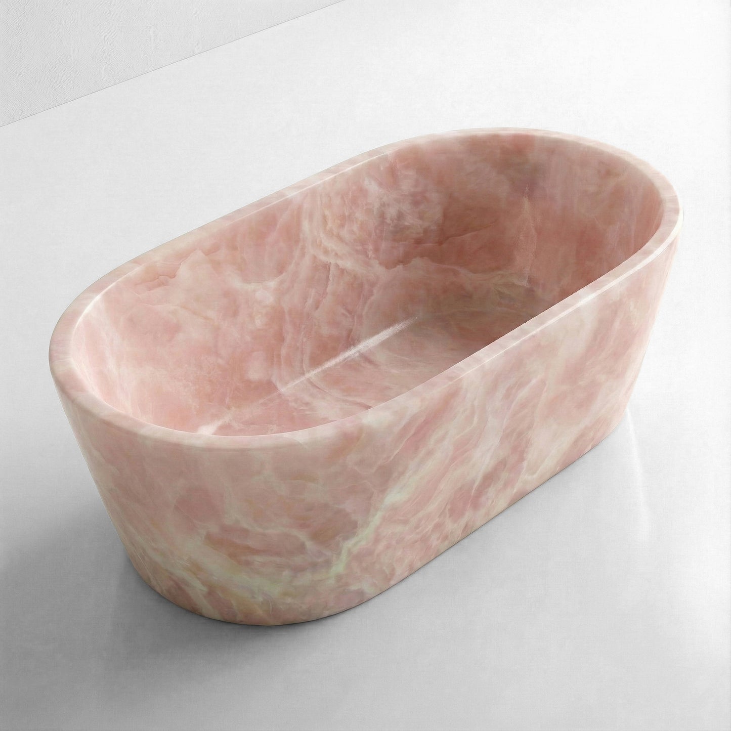 High-angle view of a freestanding oval Pink Onyx bathtub, revealing deep soaking capacity and swirling pastel pink mineral layers.