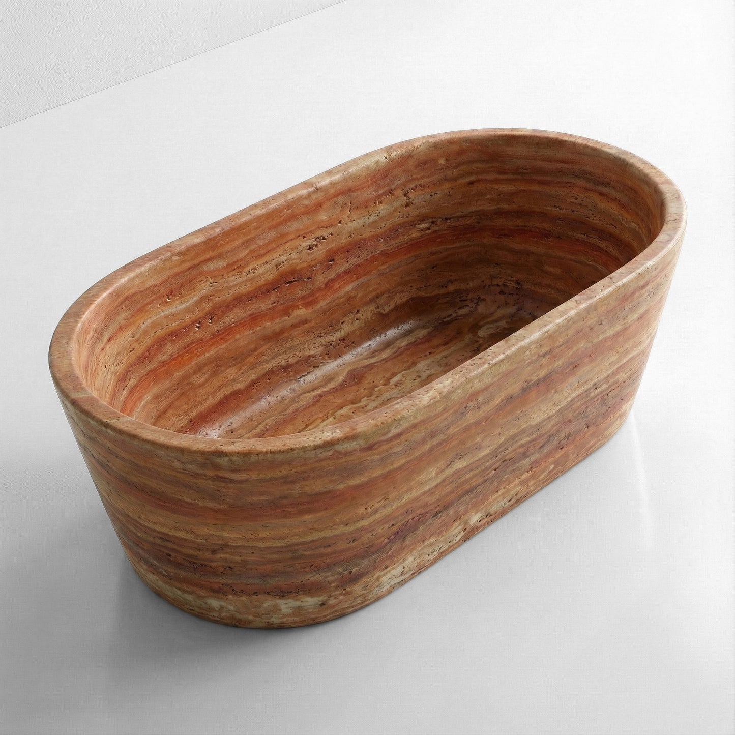 High-angle view of a freestanding oval Red Travertine bathtub featuring distinct horizontal bands of rust, terracotta, and beige natural stone.