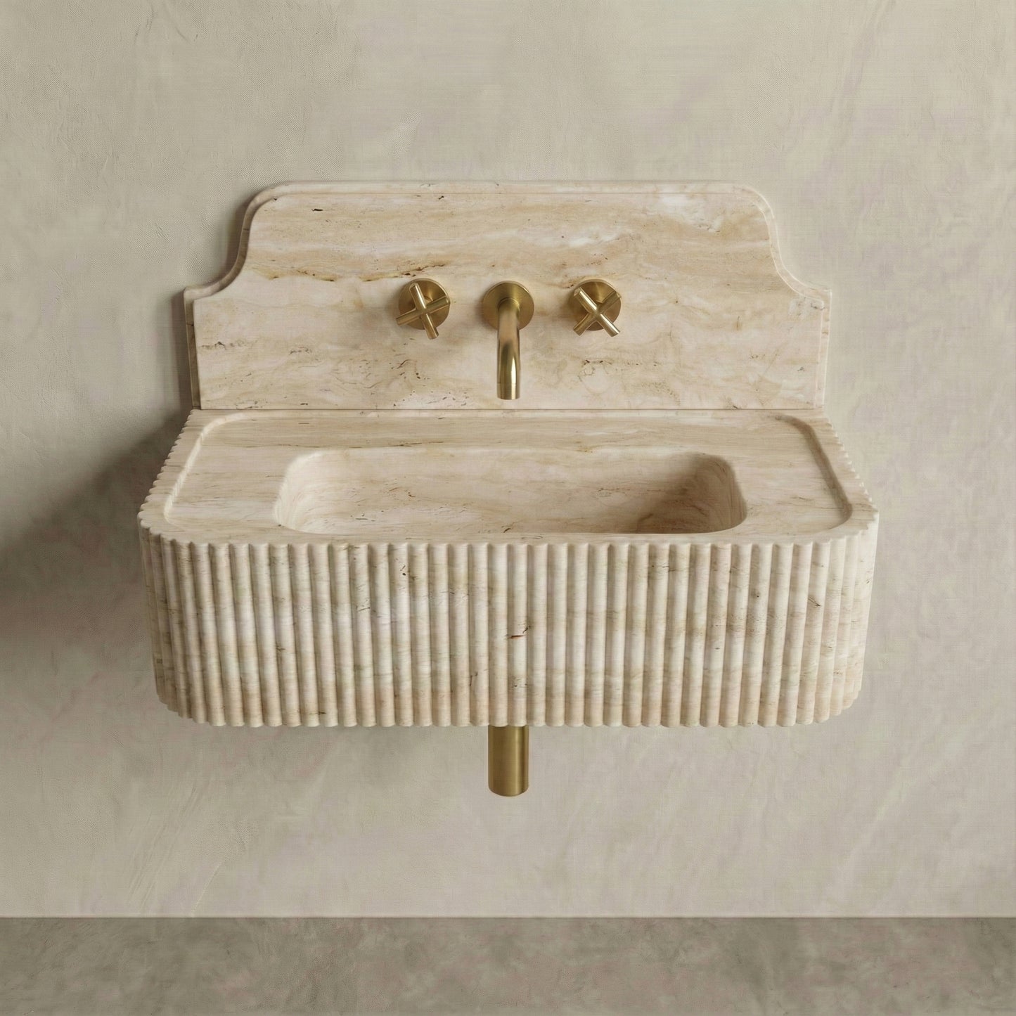 Front profile of a wall-mounted Travertine Romano washbasin featuring a decorative high backsplash, vertical ribbed texture, and warm cream natural stone patterns.