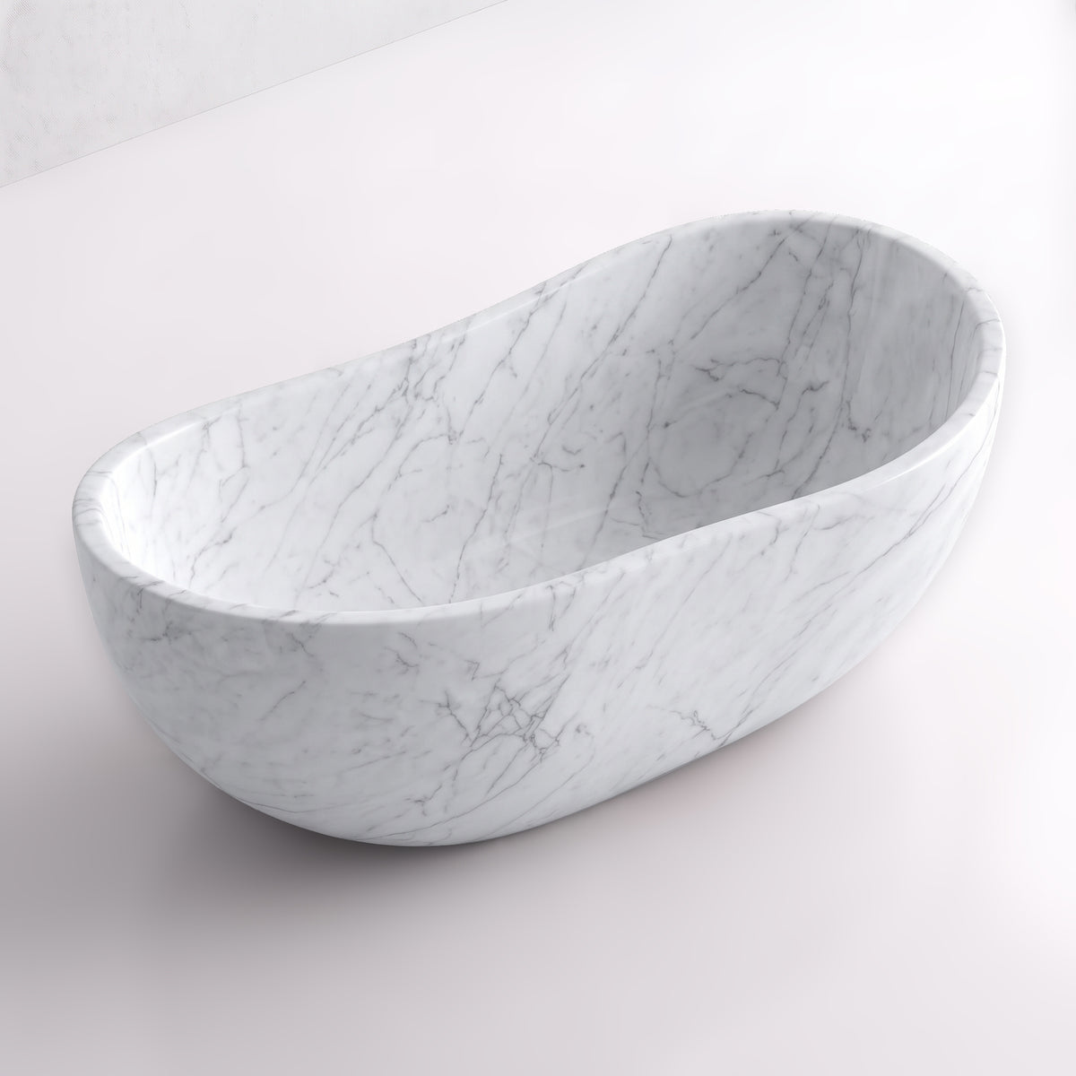 Elevated three-quarter perspective view of the White Carrara marble wave soaking tub, highlighting the asymmetrical undulating rim, seamless solid-carved interior, and delicate grey veining across luminous white marble.